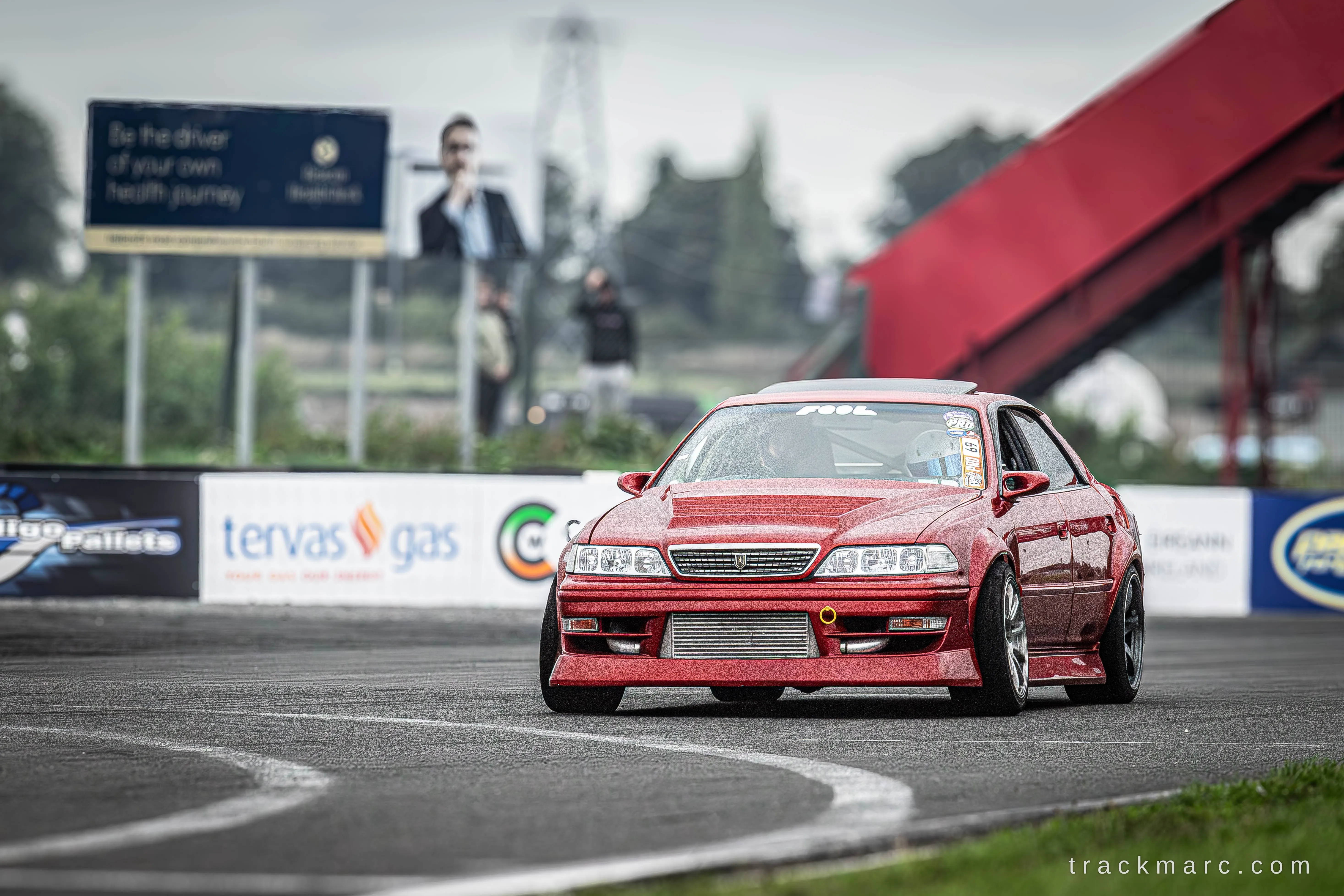 Red Toyota Chaser at 86 Fest