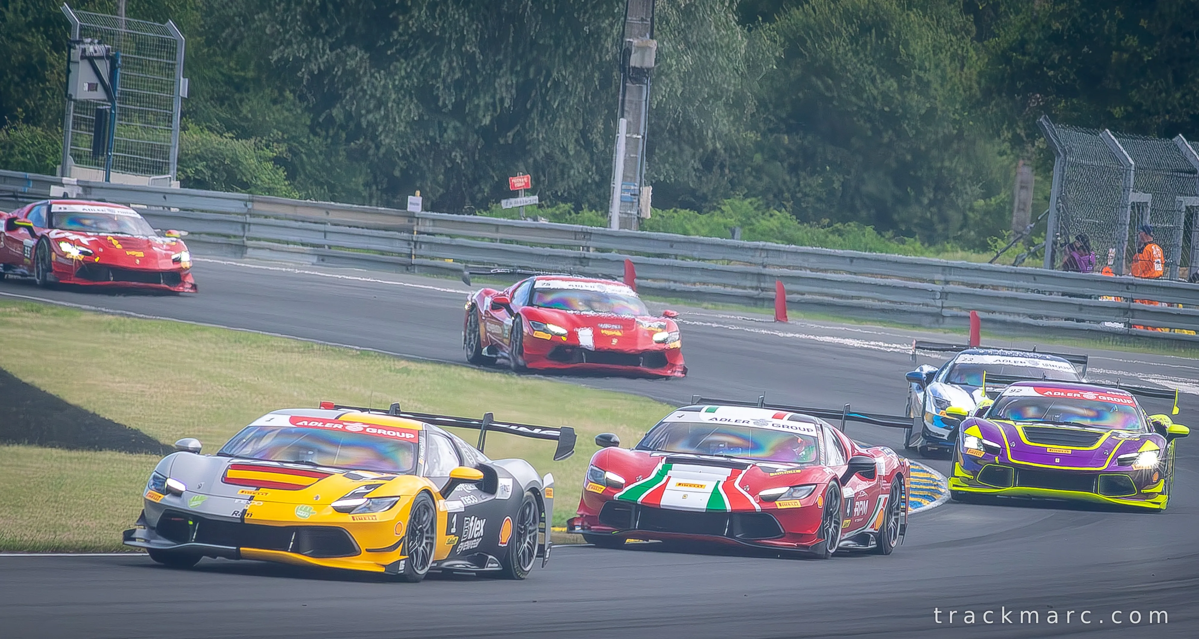 Ferrari Challenge Grid Bunched Through the Esses — Le Mans 2026