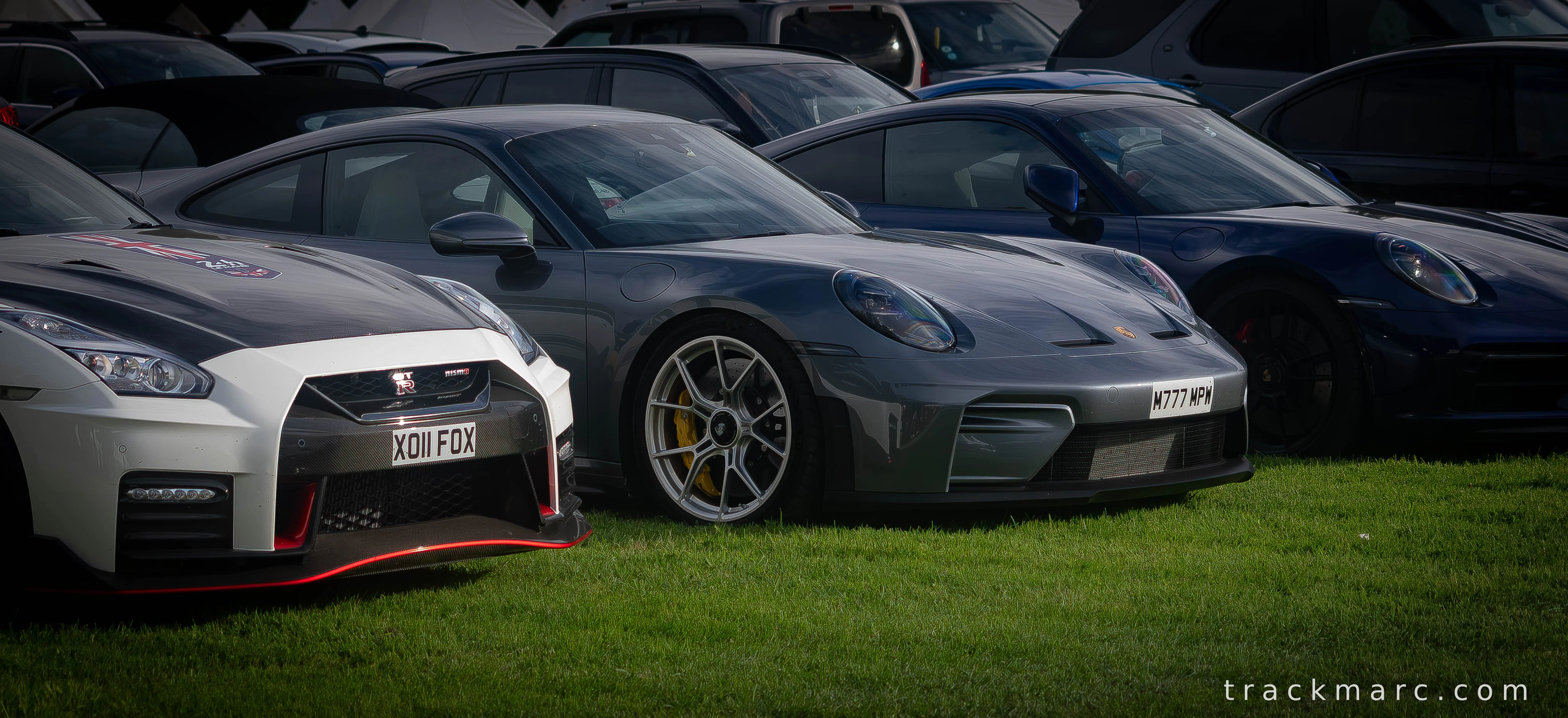 Nissan GT-R NISMO and Porsche 911 GT3 at Car Show