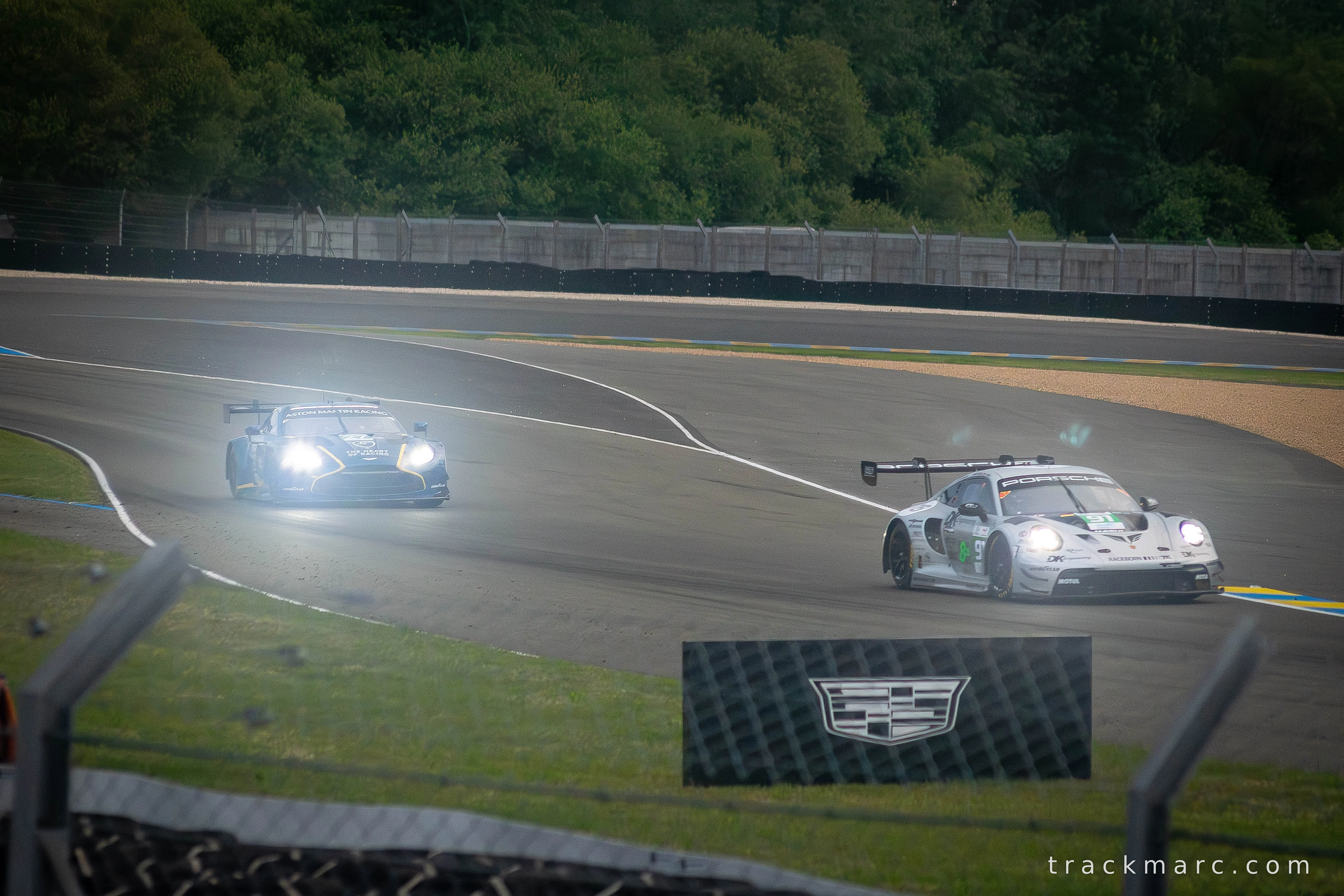 Heart of Racing Aston Martin Chases a Porsche 911 GT3 R