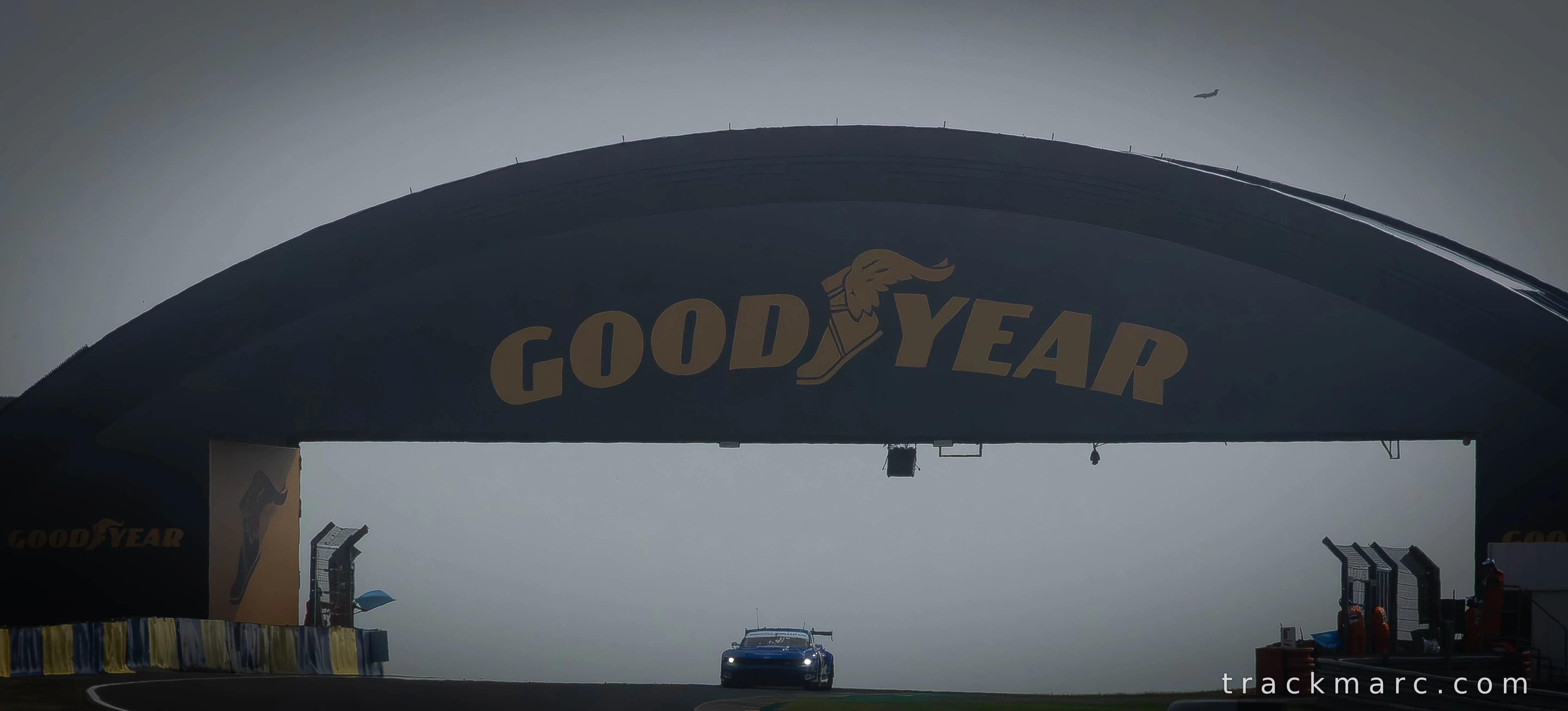 GT Car Beneath the Goodyear Bridge — Le Mans 2026