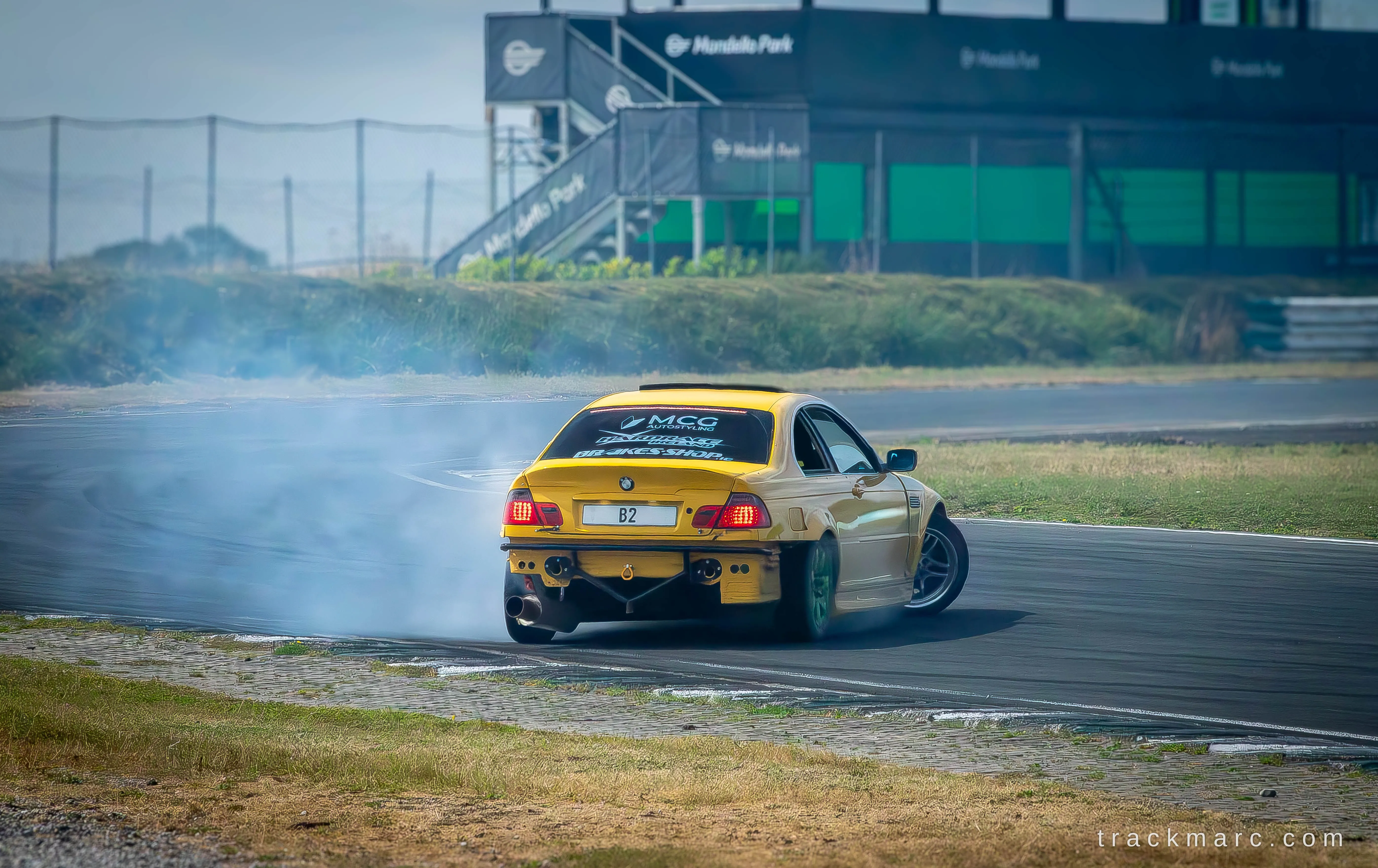 Yellow E46 M3 drifting at Bimmerfest