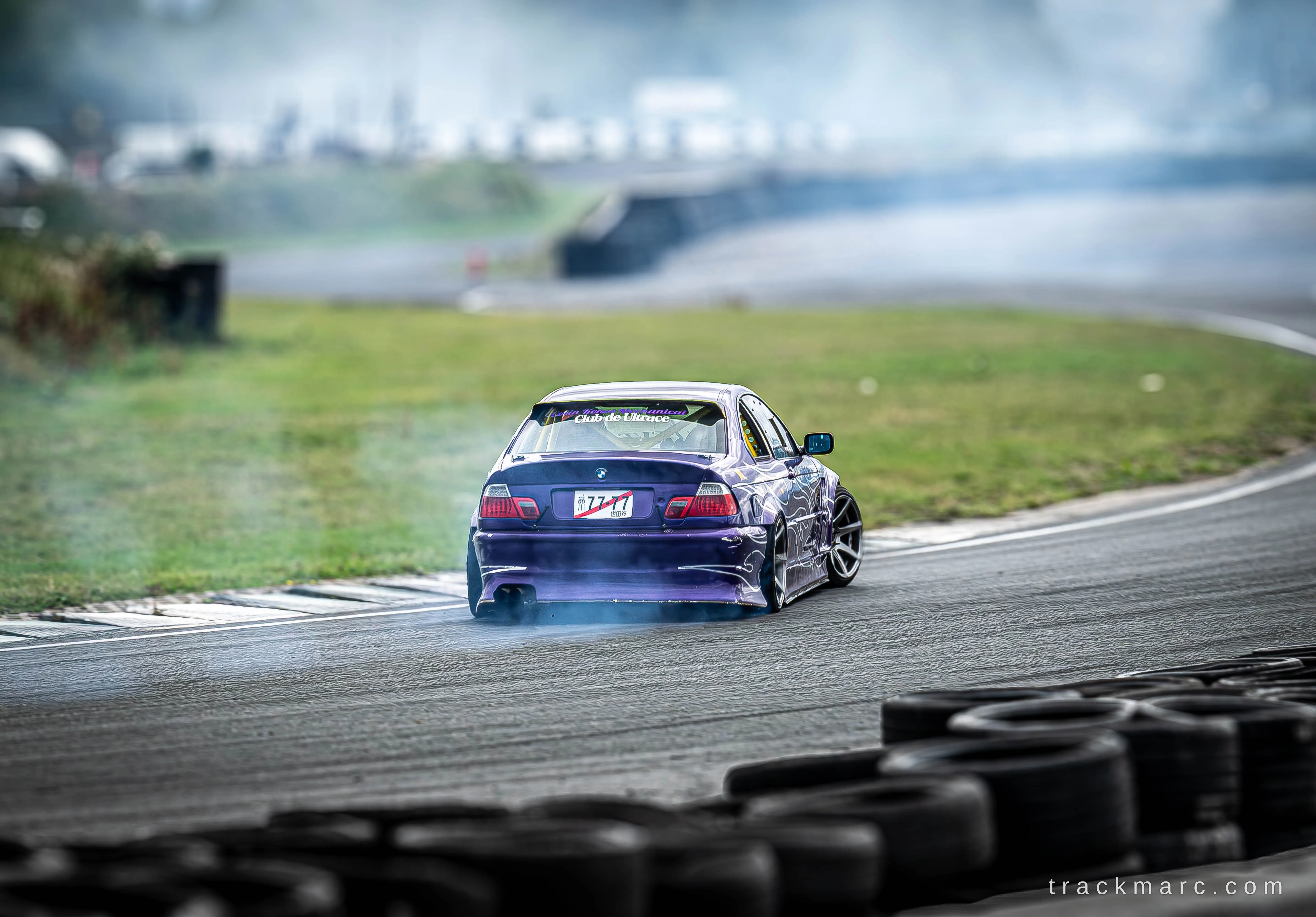 Purple BMW E46 drifting at Drift Games