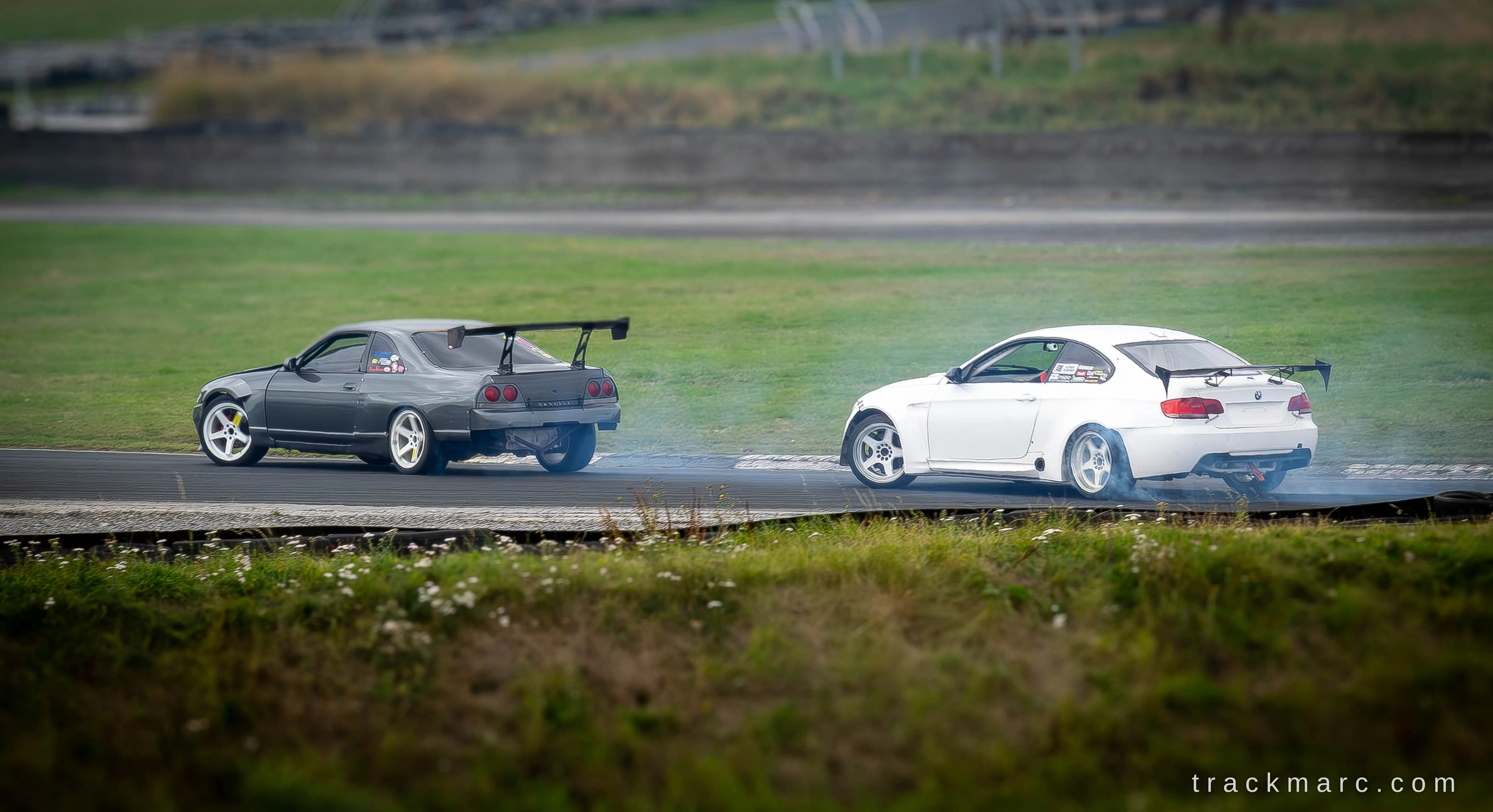 Nissan Skyline and BMW 3 Series drifting at Drift Games