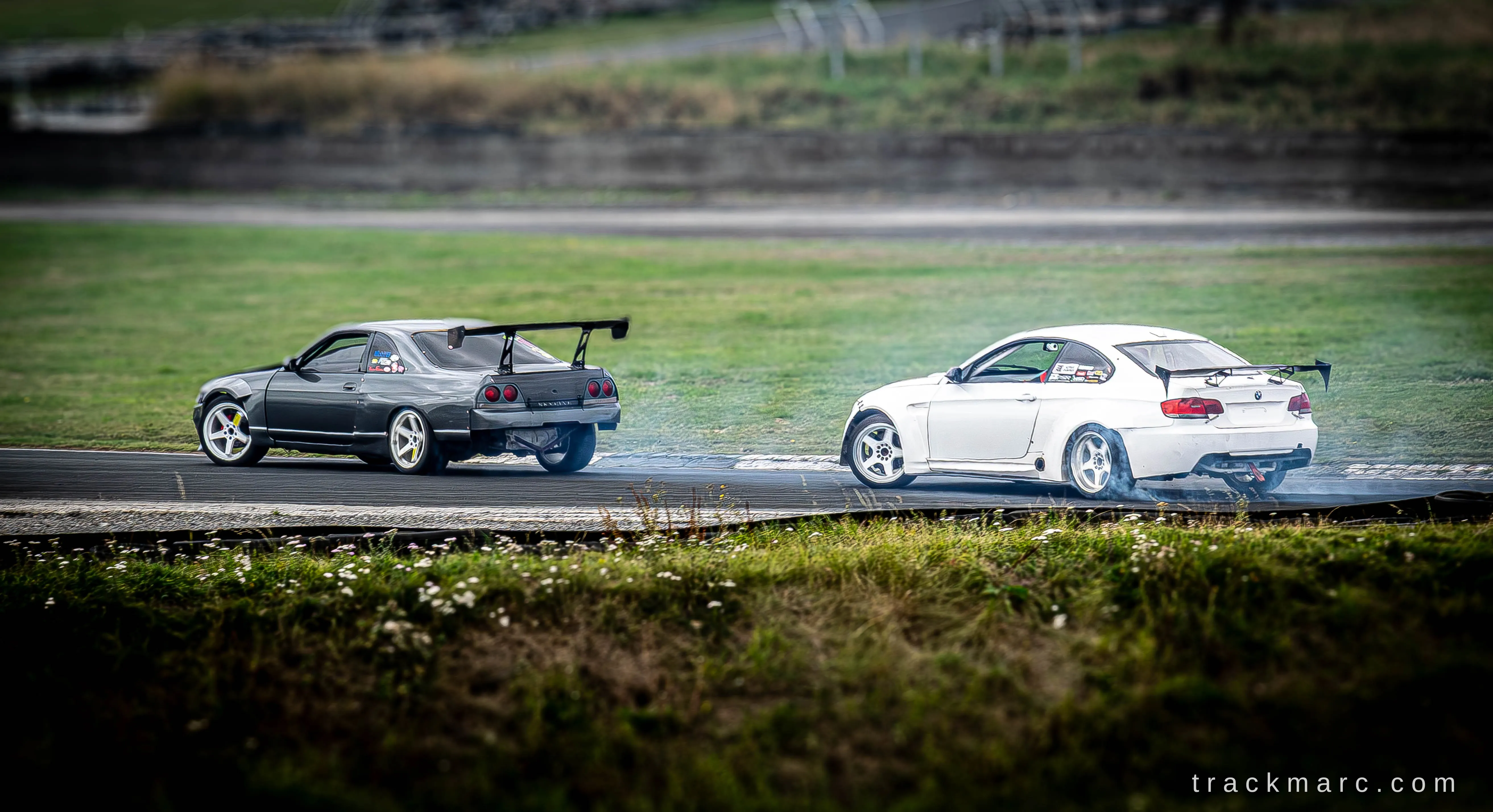 Nissan Skyline and BMW 3 Series drifting at Drift Games