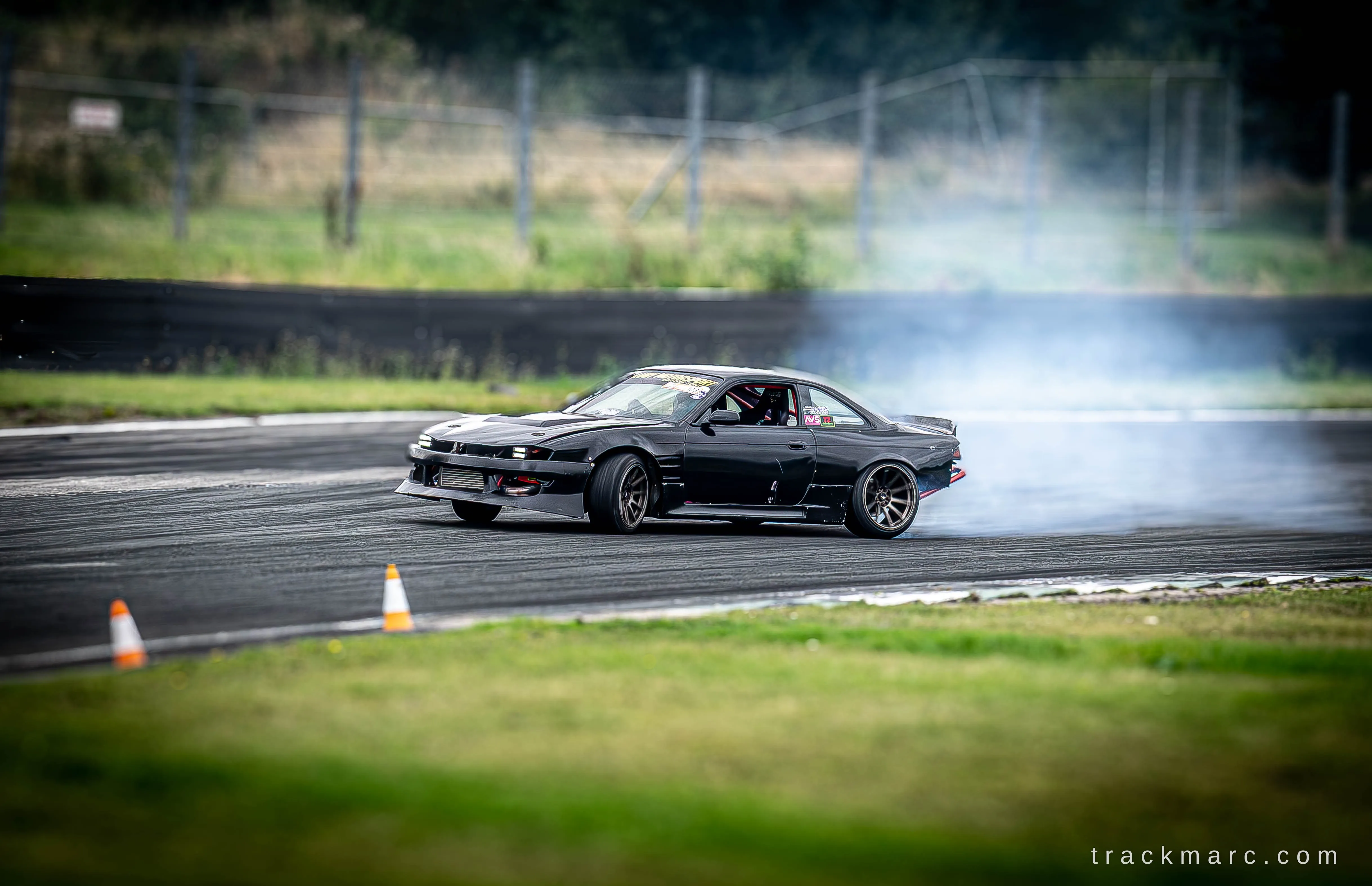 Black Nissan S14 drift car at Drift Games