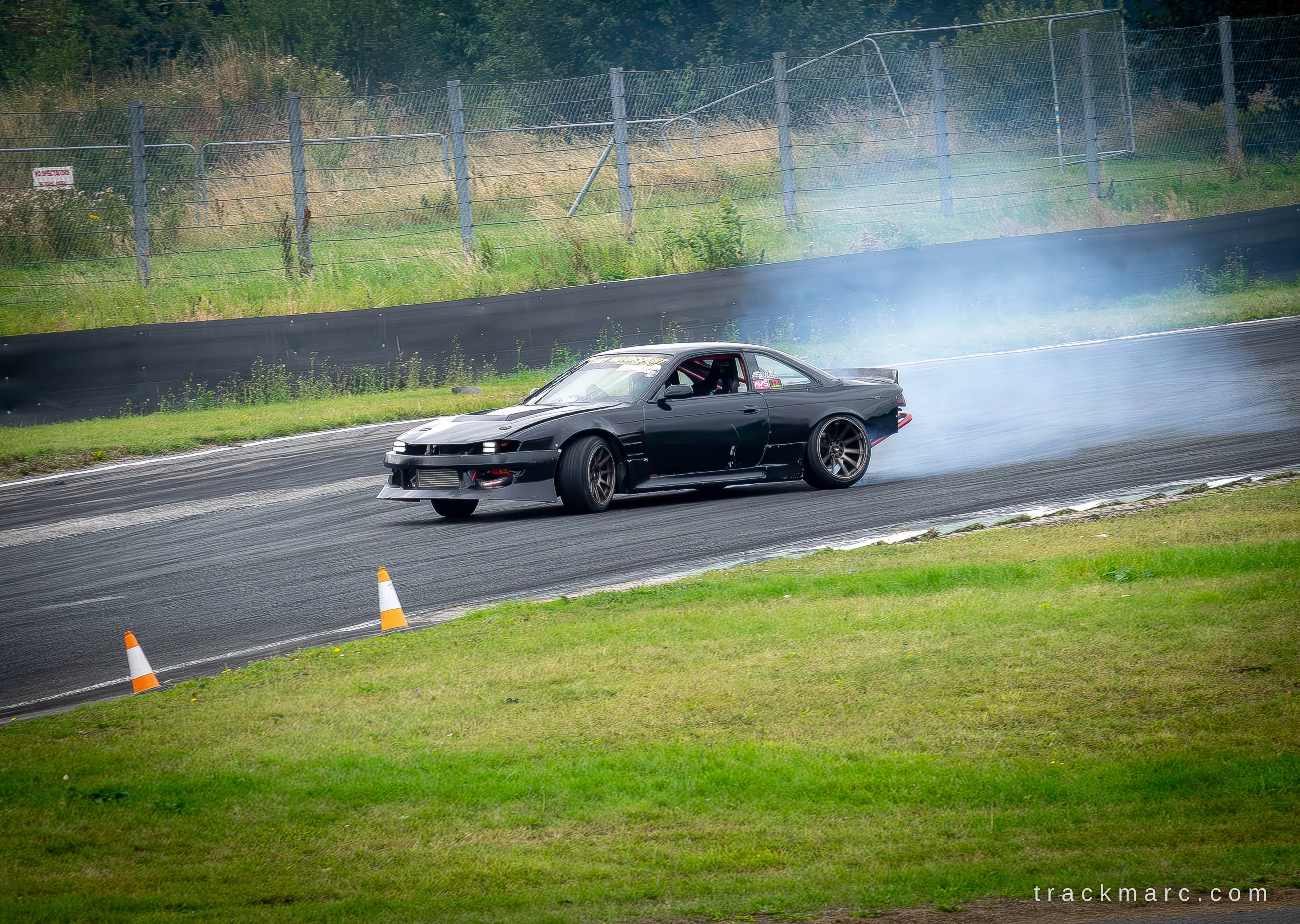Black Nissan S14 drift car at Drift Games