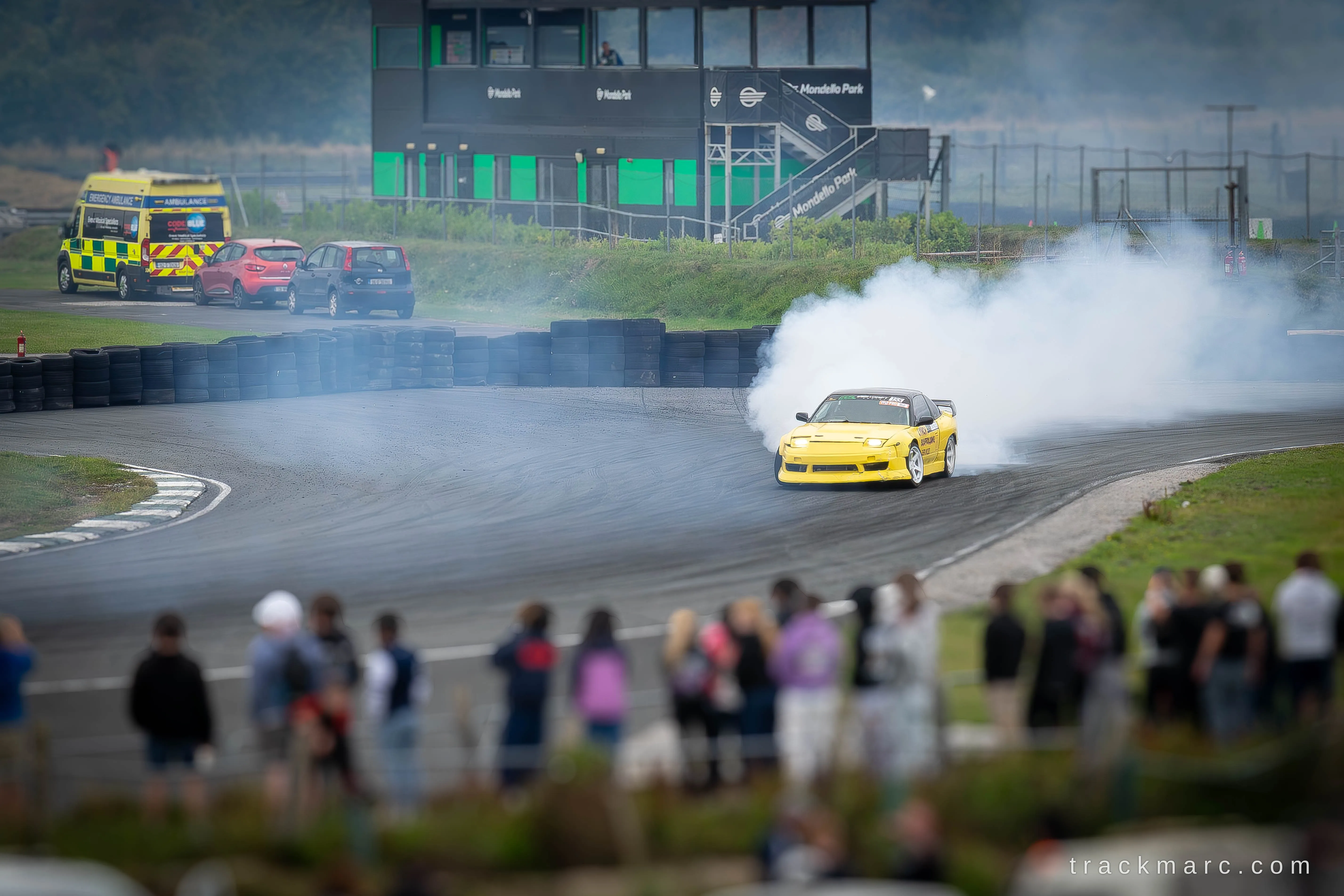 Yellow Nissan 180SX drifting at Mondello Park
