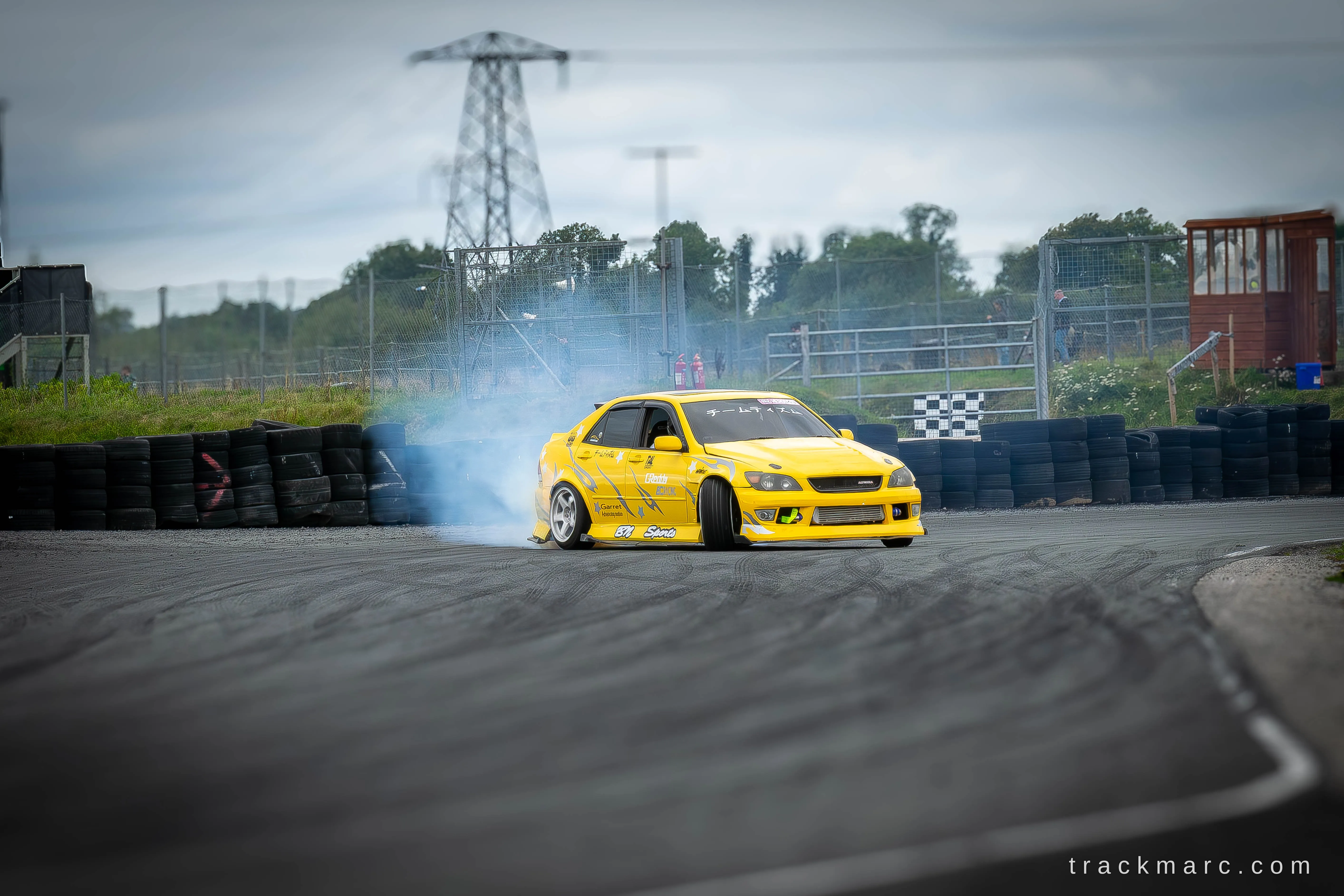 Yellow Lexus IS drift car at Drift Games