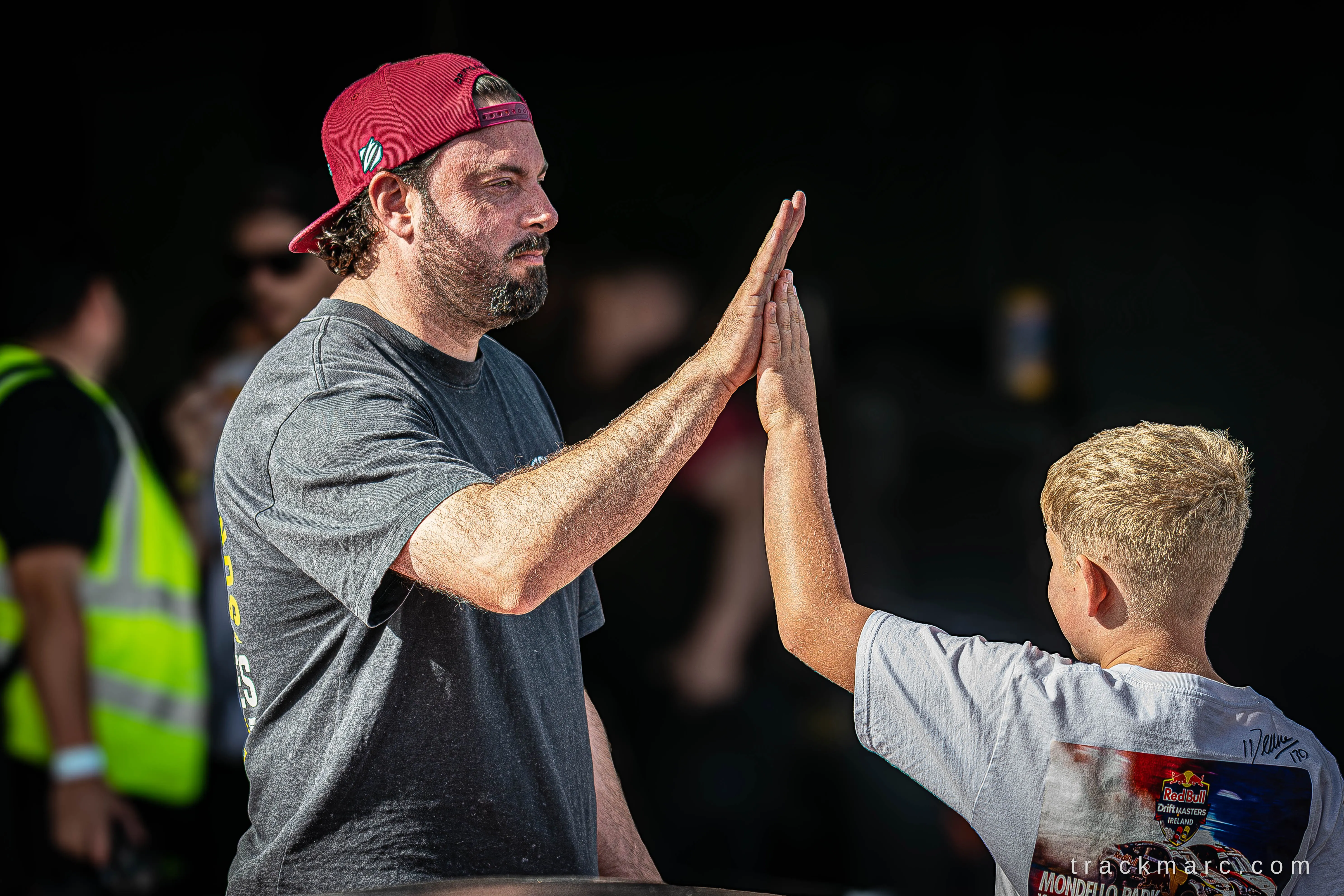Dave Egan high-fives a fan — 130 Showdown